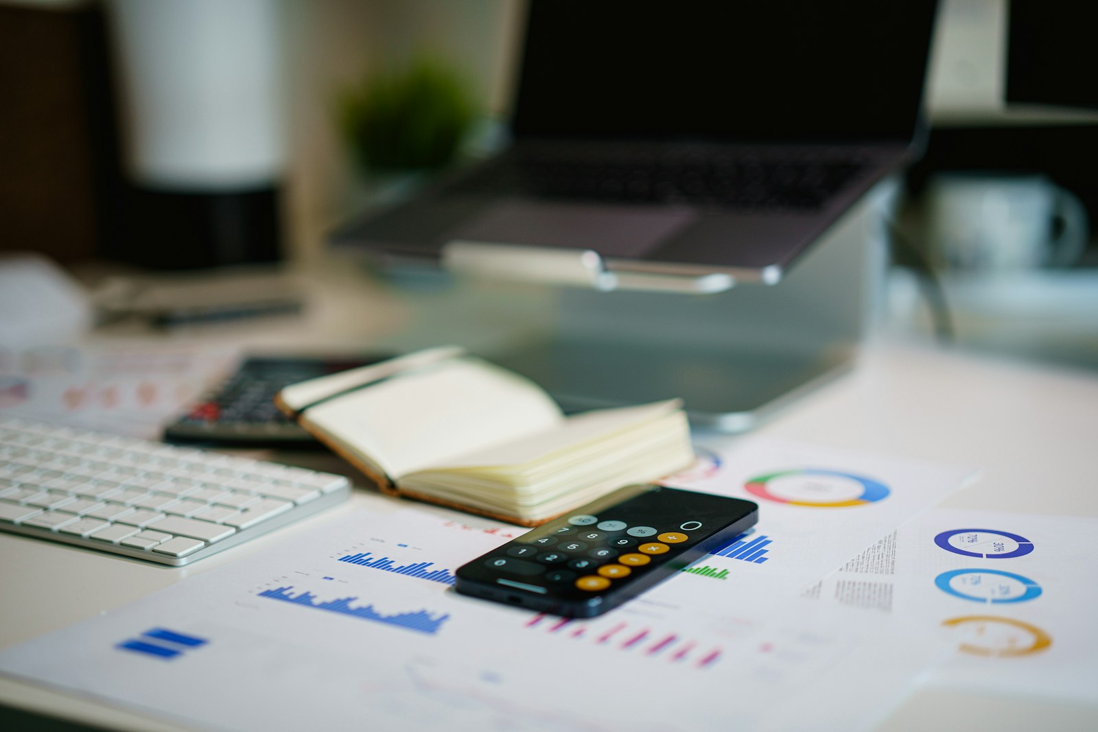 Office desk with financial charts